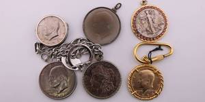 lot 54 image: US Coin w Attachments Lot - Morgan Silver Dollar