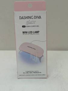 lot 137 image: Dashing Diva Glaze Nail Care LED Mini Lamp
