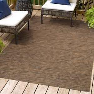 lot 28 image: Ethan Modern Flatweave Brown 8 ft. x 10 ft. Solid IndoorOutdoor Area Rug by JONATHAN Y  Customer Returns See Pictures