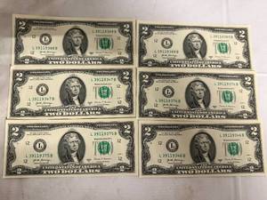 lot 11 image: 6 Uncirculated $2 Bills