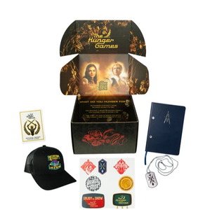 lot 417 image: LOT OF 2 The Hunger Games The Ballad Of Songbirds & Snakes Official Merchandise Collection Box