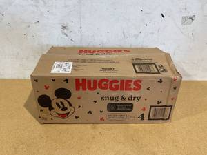 lot 577 image: Huggies Diapers, Snug & Dry Baby Diapers, Size 4 (22-37 lbs), 180 Count