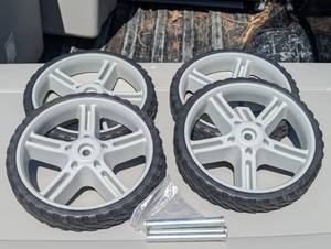 lot 70 image: Set of 4 - 10 Hard PlasticRubber Wheels With Pins - 58 Center Hole