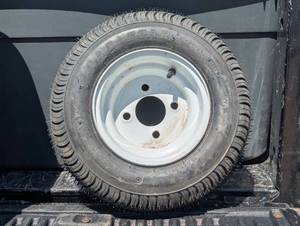 lot 76 image: Load Star - 16565-8 - 4 Lug Wheel - White Rim