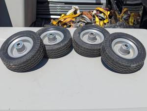 lot 78 image: Set of 4 -6x2 RubberMetal Wheels - 12 Center Hole