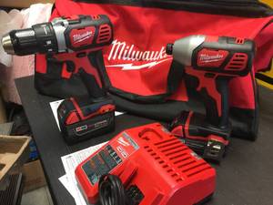 lot 121 image: Brand New Milwaukee M18 Cordless Impact & Drill Set