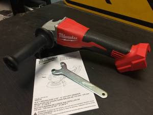 lot 123 image: Brand New Milwaukee M18 Cordless 412 Grinder - Tool Only