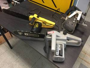 lot 143 image: 3 Electric Chain Saw Tools - Working
