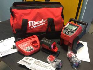 lot 230 image: Brand New Milwaukee M12 Cordless Compact Inflator & Flood Light Set