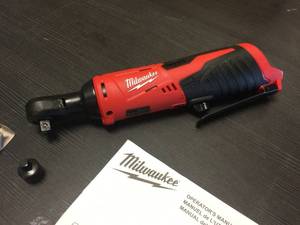 lot 231 image: Brand New Milwaukee M12 Cordless 38 Ratchet - Tool Only