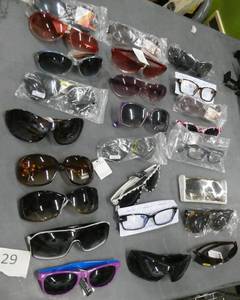 lot 29 image: 25 pair of adult sunglasses (a couple are readers)