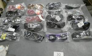 lot 30 image: 20 pair of adult sunglasses