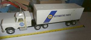 lot 53 image: NYLINT - NAPA semi truck and trailer with roll up door