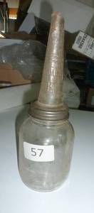 lot 57 image: Antique 1922 MOBIL E Oil bottle