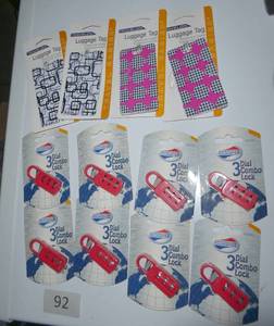 lot 92 image: Group of luggage tags and locks