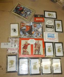 lot 128 image: 19 Decks of new playing cards and 12 dice