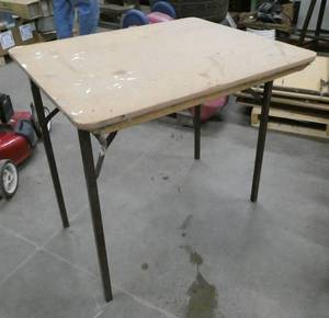 lot 26 image: THREE 36x30x32 tall Folding tables