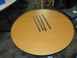 lot 607 image: ROUND, HEIGHT ADJUSTABLE LAMINATE TOP TABLE