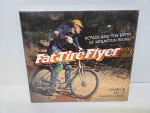lot 117 image: Brand New Large Sealed Coffee Table Book - Fat Tire Flyer Repack & The Birth of Mountain Biking