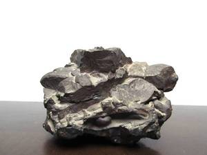 lot 71 image: Unusual Semi-Metallic Rock - Possibly a Meteorite