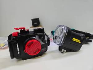 lot 174 image: Like-New OLYMPUS PT-058 Camera Underwater Waterproof Case & Many Accessories