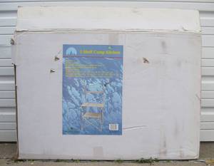 lot 233 image: Unused in Box Folding 3-Shelf Camp Kitchen