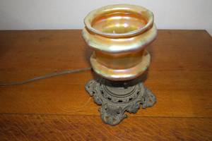 lot 15 image: Amber glass lamp with metal base...