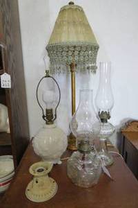 lot 74 image: Kerosene and electric lamps...