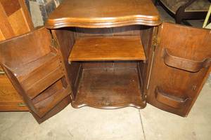 lot 85 image: Sewing machine cabinet made into st...