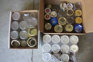 lot 104 image: (3) Boxes of canning jars...