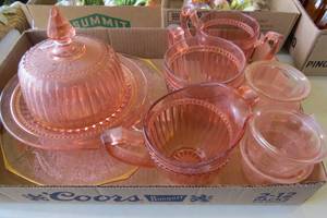 lot 110 image: Pink depression glassware...