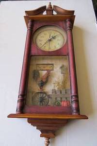 lot 112 image: Battery operated rooster wall clock...