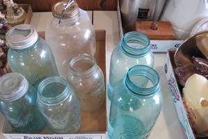lot 134 image: Blue and clear fruit jars...
