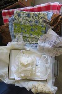 lot 138 image: Linens, table cloths, childrens clo...