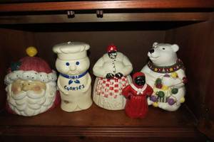lot 170 image: Cookie jar collection and cast iron...