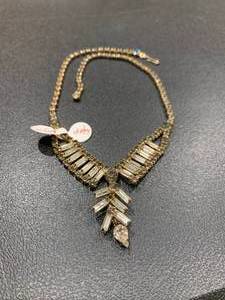 lot 212 image: Gold-colored necklace with rhinesto...
