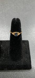 lot 215 image: 10K gold ring with sapphire and dia...