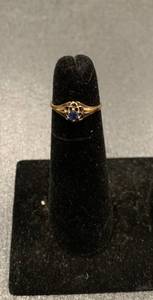 lot 217 image: 10K gold ring with blue sapphire-li...