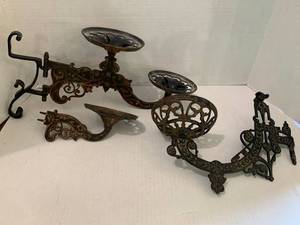 lot 220 image: Kerosene lamp wall brackets...