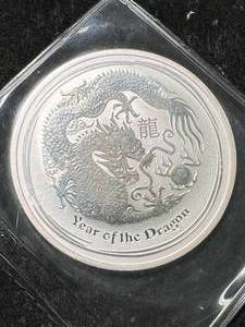 lot 18 image: 2012 AUSTRALIAN YEAR OF THE DRAGON 1 TROY OZ .999 FINE SILVER