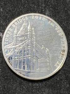 lot 36 image: 1 TROY OZ .999 FINE SILVER 2018 TOWER BRIDGE ROUND