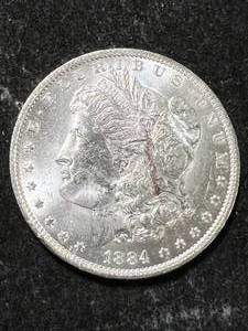 lot 37 image: 1884-O US MORGAN SILVER DOLLAR