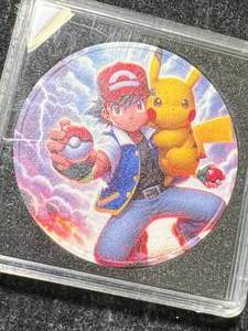 lot 63 image: 1 TROY OZ .999 FINE SILVER POKEMON ROUND IN CASE