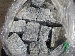 lot 83 image: Granite Tumbled Cobblestone, roughly 7x10x3