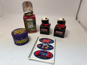 lot 11 image: Dale Jarrett Notebook and Ornament, Joes Racing Camel Powdered Tin, & Simpson Mini Helmet