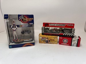 lot 19 image: Hasbro Winners Circle Jeff Gordon, Super Sray 1991 Team Convoy, Jimmy Spencer, John Wayne Diecast