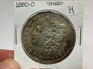 lot 14 image: 1880- O Morgan Silver Dollar