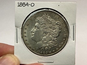 lot 23 image: 1884-O Morgan Silver Dollar