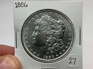 lot 27 image: 1886 Morgan Silver Dollar