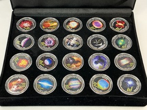 lot 74 image: 20 Space Themed Colorized Kennedy Half Dollars.
